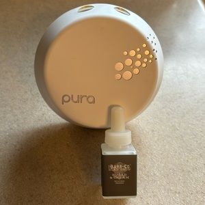 Pura Fragrance diffuser and replacement fragrance